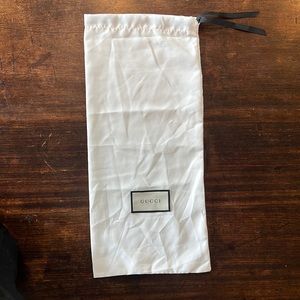 Silky white vertical Gucci dust bag
